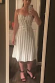 Very cute! Bought this to wear to a graduation. A little tight in the waist and back but it still fits. Lined. - Brenna R.