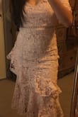 It looks beautiful in the picture and it makes my body look great BUT it has too much going on. - Vasti G.