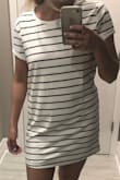 I love this t-shirt dress look. Unfortunately, this dress is super thick so it was just too heavy for me to LOVE it for what it was. (I live in South Florida, so a lot of material doesn't really fly for me!) This white dress does have a little slip layer in it, but I'm talking more about the top layer. Also as everyone else noted, if you were to raise your arms up, it'll ride up and show your rear so be careful.
I feel if the material were more flexible and giving, it would help with all the issues I noted... I can see why others might love it though. - Nikki B.