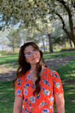 I ordered this dress for my brother's outdoor wedding. The color of the dress was vibrant and perfect. However, it runs rather large. I ordered an XS but the dress was too large in the shoulders and too long. Most things I order tend to be too big, so I usually expect when ordering and fortunately, my grandma knows how to sew. She put a tuck in the shoulders that brought them up/in about an inch and then took another inch up in the waist (she actually removed one of the buttons, but you can't tell--view close up photo). Additionally, my hips are actually less than a 34 but that's the lowest number available. I have "hip dips" where my hips are flat on the sides. When buying dresses, I always have to be mindful of this and this dress was very flattering on the hips. I am glad I bought the dress and look forward to wearing it again. - Cassidy R.