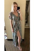 This dress was amazing. It was a little loose on top but it was easily fixed with a safety pin. Everything else fit great. It was the perfect length for me and I was able to wear heels without it being too short! Definitely a perfect 10! - Ashley H.
