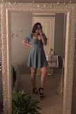 This dress is amazing. It does show a little more cleavage for bigger breasted gals, but I don't mind. Super comfortable, not short, and super flattering. - Kassidy G.