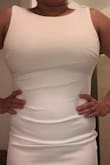 Dress fits perfect material is very nice a little long for me but I am also short so nothing that can't be fixed. - Isela V.