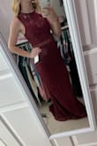 The dress is very beautiful but ran a little big on me. The chest area did not fit because it hang slightly too low, and you could see my bra. It was about 6 inches too long (which is normal for me). The dress looks just like the picture, but I just needed a bigger chest for the dress! - Maddi W.