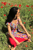 This dress feels amazing. It has a inner liner made of a silk like material to keep you cool in warm summer days. The colors are so vivid, and I love the shoulder details. The dress is really easy to move in and fits your frame, but you still have a little extra room. - Keyanna M.