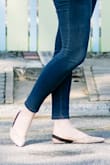 Runs true to size, but the elastic slips a little bit as you walk. Not a huge deal - still love the shoe. - Cassandra M.