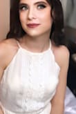 This was the perfect dress for my engagement pictures! It was plain but the top was very nicely decorated as you can see in the closeup picture I posted. It's not see through either. Great purchase!! - Kathryn D.