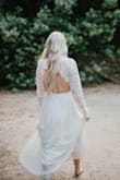 It was a little loose on the arms, but overall beautiful! It was long, so if you are short may need alterations, but I liked the long length! - Kristen P.