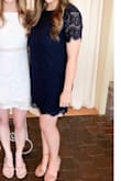 I absolutely loved this dress. I ordered a size large, and it fit perfectly. Wasn't too loose (definitely didn't give a bad side profile), but it wasn't tight either. I got a ton of compliments! - Caroline C.