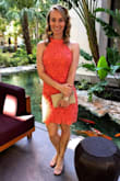 I absolutely love this dress! I purchased it for a friend's wedding in the Bahamas, and I also plan to wear it to a few graduations in May. The dress fit perfectly everywhere, except was a bit loose at the neckline. This made the dress sit a little lower than I liked, showing a bit more of the underarm/breast area than expected. However, this was easily fixed by slightly altering the strap around the neck. The color is a gorgeous coral and I received so many compliments on the dress! - Brittany D.