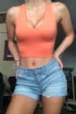 I ordered this in the orange and purple color and I'm in love. It's made of super soft material and it's not too thin so my bra doesn't show through or anything. Perfect length, cut, and fit! One of my new favorite shirts for sure! - Carol M.