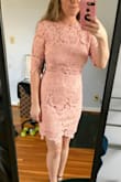 I bought this to wear to a spring wedding last second after I already had a dress I didn't love. I am so glad I did. I got so many compliments wearing this. I would say it's a little tight for a sheath dress. I ordered a medium which is what I usually am. It was A little fitted but not too tight and I wouldn't go up a size. Being a 34D, the part below the bust above my tummy was very loose and didn't touch the body. It didn't look bad, but it was looser in some areas on me. Also I had to wear a sticky bra, because the peek a boo under the bust showed my strapless bra. Again, if you're bustier than me maybe size up. Overall, I loved it and can't wait to wear it again! - Samantha W.