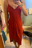 This dress material is thin which makes it perfect for summertime weddings and parties! The fit is true to size for me and the length is a little past the knees. It's a little wrinkly but nothing a quick steam iron won't fix. There's no stretch to the material and I can see how this may not be true to size for everyone so if you're worried about the fit, try a size up! - Mina N.