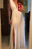 I fell in love with this dress and had to own it! I don't even have anywhere to wear it, just feared it might sell out. It is beautifully made and lined, seems a tad too long even in heels. I got it in white, which I think will make it more versatile; from brunch to a ball!

Update: I wore it on a summer date and he proposed! LOL A stunning dress! - Nicole G.
