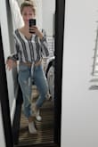 These could go with anything. They fit me like boyfriend jean would. They're right around the waste and loose around my calf and ankle. I love these - Kendra S.