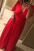 I am 5'4" and about 165 lbs with an hourglass figure. I saw the previous pictures posted and decided to give this maxi dress a shot. The length would've been fine with heels but the fabric itself was so bulky on the bottom skirt! It is good that it's not see through but you could not even see a slit at all for me, maybe due to my shorter legs than the model above. I returned. - Rebekka A.