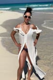 This top is beautiful and can be worn as a beach cover up or as part of an outfit. I wore mine as a cover up and received numerous compliments. It's super light weight, very thin (fragile) material and chic. - Stephanie R.