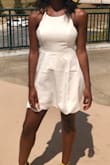 Hey guys! I went through A LOT of reviews before buying this dress. Being a size medium, I decided to purchase a size small. In some pics the dress seemed to droop a little at the top or be a little longer than I wanted. I have a small chest but broad shoulders, so I was a little worried the small wouldn't fit. but you guys! It was perfect! Even if you have large hips or a large butt, the full skirt provides plenty of room so the dress will still look classy. Definitely wear without a bra. You may feel self conscious at first, but you will be glad. Pasties will show through just bc of the light coloration of the dress, but I promise your nipples won't show through. Just focus on your waist size and potential side boob if you have larger ones, and you should be ok! Also, I'm 5'11", and the size small was long enough for me. I also stained my dress with marinara sauce, and I wasn't able to get it out until I got home about an hour later. Whatever you do, just dab with water. Once home, wash with a little bleach (I used my washer machine), and it'll be good as new! Pictures attached! - Donna P.