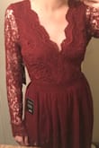 I got this dress as my bridesmaids dress for my sister in laws wedding. The dress is super pretty and a great price! It's pretty long so I'll need to get it hemmed, and the sleeves and chest area are a little loose. It fits around my waist for the most part. I'm 8 weeks postpartum while trying this on so it may fit me differently once I start working out again. - Megan L.
