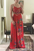 This dress is absolutely amazing! I bought it for my honeymoon and wanted something fun and light. I usually never get red anything, but this is so stunning! Very excited to wear this on my honeymoon! The wrap skirt and lace up top allow for the perfect hourglass fit! Definitely need to wear heels, if you're short like me. Or get it hemmed. Just fyi! - Alli G.