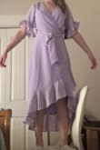 I really like this dress. I will probably wear it again for a more casual affair, and I may have to make the v neck a little higher to lower the cleavage I don't have, but otherwise I like it and you can adjust the waist with the bow/tie. - Andrea B.