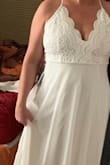 Absolutely beautiful dress. Great quality and very well made. A little long but that's an easy fix.. I'm very satisfied. - Chasity M.