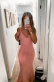 I've ordered from Lulus many times and I'm amazed every time! I originally ordered a small, but it was way too long and way too big!  I ordered again in an xs and it fits almost perfectly! It's a tad loose around my waist in the back, but it isn't too bad! If I wear 5-6 inch heels it's exactly floor length! - Grace W.