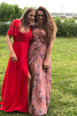 Wore this to a wedding and got so many compliments. It was the perfect length with my heels! I did have to pin the front up a tad so the girls wouldn't pop out but that was it. It was comfortable and cool which was necessary for an outdoor wedding in the south. - Bailey B.