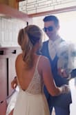 I know this dress kind of looks like a wedding dress but I wore it for my prom and it was perfect! Only thing was I had to get it shortened on the bottom but that wasn't a big deal since it was such a good price! The White looks awesome with a tan I got so many compliments! Highly recommend this dress! - Sierra L.