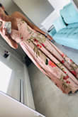This is s beautiful quality dress but is a little big. I am planning on wearing the dress to a destination wedding for one of my siblings! It'll be perfect! It's light and airy.
I will need to take in the waist, secure the belt better and make the leg slit longer/higher. - Kristy T.