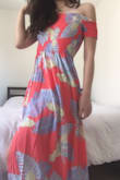 It has beautiful color, nice flowly fabric. But it was way too long and I had to hem good 5inch to not drag it on the floor. Chest is pretty tight. I found out this arm restraining design looks cute but is not practical and uncomfortable. - Juyeon K.