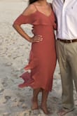 I wore this dress to a beach wedding. It was perfect!! I have a small chest but this dress fit my top good and didn't gap or anything! Only complaint is the fabric showed everything even my belly button so I did wear spanx. - Emma R.