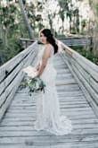 This dress fits like a glove! It was absolutely perfect for my intimate, lakeside wedding. I only had 2 1/2 weeks to plan my wedding and was completely shocked by how amazing the details on the lace. It was everything I imagined for wedding dress. The top may fit a little snug if you're busty, but definitely don't shy away from it if you're curvy! It looks just as gorgeous on curves. - Isabella R.
