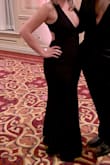I got this dress for a formal wedding and I LOVE it. It fit great and was a bit stretchy so it was extremely comfortable. It was a little long for me with 3.5" heels but looks easy to hem. I got a ton of compliments on it and can't wait to wear it again! - Shauna L.