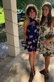 Needed a dress for my friends engagement party. I will totally be reusing it for all sorts of summer events. Loose and comfortable but short enough to still feel flirty. The high neck with bow tie in back was so pretty. - Madeleine M.