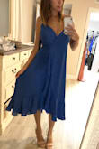 I purchased this for my cousins summer wedding and I think it's perfect for the occasion. The color isn't exactly the same as the image it's a deeper blue in person, but it's still pretty. Like and wrap dress, I need to tie it tight so my girls up top aren't falling out. Overall fits well! Super cute. - Lisa C.
