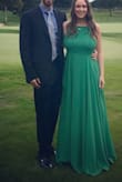 I wore this dress to a wedding this past year and I got so many compliments. If you have a larger bust, I would recommend those pasties that lift your breasts up because I had alot of side boob going on. I did have it taken in slightly so the waist was accentuated but I could've worn it as is. - Erin M.