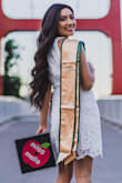 Based on the reviews, I chose to order mine in an extra small to get a more form fitted look and it fit perfectly. This dress is great quality, not see through, and was a perfect choice for my grad photos! - Melia B.