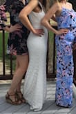Good quality. Fit true to size. Long, but I expected that anyway. I am 5'9" and wore heels for reference. Would recommend! - Alyssa D.