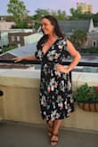 Beautiful pattern. Wrapping and tying were confusing. The neckline kept coming open. Had to size up to accommodate my bust which made the bottom a little big. Shows fair amount of cleavage. I do love this dress and will wear it again! - Rachel C.