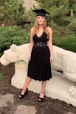 I ordered an xs and it was about a foot too long. I hemmed it and made it into a midi and wore it to my graduation. I received so many compliments. - Hayley N.