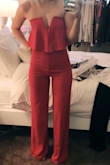 I ordered this in both black and red and I am OBSESSED. I order from LuLus far too often and always run size S. Based on reviews, I ordered XS, and they fit me like an absolute glove. I am 5'5" and you can see it's a bit long, but should be perfect with the right heels. I couldn't say enough great things about this. Great material as well. - Elizabeth G.