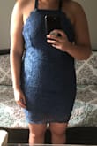 I looooooove this dress. It's very flattering; It hugs my curves in all the right places. I was worried that the large wouldn't fit from reading other reviews, but it surprisingly did. I would suggest ordering a size up for a little more wiggle room, as it definitely would have been more comfortable while sitting down. I paired this with a pair of Spanx just to smooth things out, but be careful with the slit in the back because it could show the shape wear. This dress is a must have for weddings, you won't be disappointed! - Megan P.