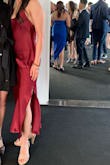 I wore this to a banquet on a yacht & it was perfect! Everyone loved it. It's so simple, yet classy & sleek. The length was perfect & the slit was a nice touch. My only issue was it's a little loose around the chest area, but not loose enough for me to have to alter or pin. - Aja L.