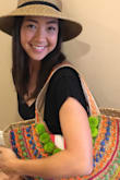 This bag is so colorful and fun! It's perfect for the beach or to make a statement with a causal outfit during the day. It also has a pocket with a zipper for your phone, keys and credit card. It keeps them safe from the sand and makes this bag adorable AND practical. - Ashley T.