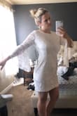 After reading reviews, I sized up. I actually ordered an XL because I didn't want it to fit body con and it looks really cute. I'm normally a medium or large. I ordered it for my bachelorette Gatsby theme and I'm going to pair it with red lips and a head piece! - Devyn D.