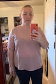I read the other reviews before purchasing and if I remember correctly, they specifically said the shirt WASN'T see-through, but as you can see from my picture, it's completely see-through. The fabric is scratchy and uncomfortable. The hem seems uneven - I know it's not a straight hem and that's fine, but it just feels like it falls in an uneven way, like one side is higher than the other. 
It also fits fine in the body of the shirt, but the shoulders and arms are tight. I could live with that if the other problems didn't exist, but with all this, I will be returning this shirt. - Erin A.