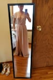I had previously ordered a small since I always wear a size small (size 4 in dresses) but got reluctant after reading the reviews. Reviews stated that the dress ran a bit large so being as petite as I was, I quickly reached out to customer services and got it switched to an X-small. The dress is beautiful, the fabric is amazing and even with my chunky nude heels, the dress is still very long. Damn my small petite stature. It still ran a bit large for the top section but a few alterations here and there and now its perfect. To avoid any mishaps (showing too much skin in the chest area) I've also gone and purchased a fashion tape at Target to help me cover up. I am excited to see everyone as well as for my coworker who will be getting married. Thank you again Lulus! Shipping was right on time and the dress is as pictured perfect. The sizing needs work but all in all, Terrific job. - Mao V.