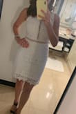 This dress was a perfect fit. I received so many compliments. I wore to a work event and was worried about the holes, but you could not see in there so do not worry! The length was perfect .. appropriate length with still being cute. It's tight enough where it holds you in and slims your figure but not too tight! Buy this! - Renee H.
