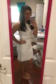 I absolutely love this dress! It fits perfectly, and the material is great quality. The length is great. It goes mid-thigh for me if not just a bit further, I can also get away with wearing a normal beige bra with it. It is a delicate dress due to the details of it. I bought it for both graduation and bridal celebrations. I highly recommend this dress. It's beautiful. - Maria T.